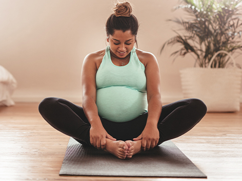 pregnant mom doing yoga