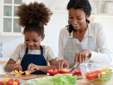 Mom cooking with daughter