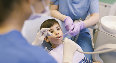 Child receiving dental care